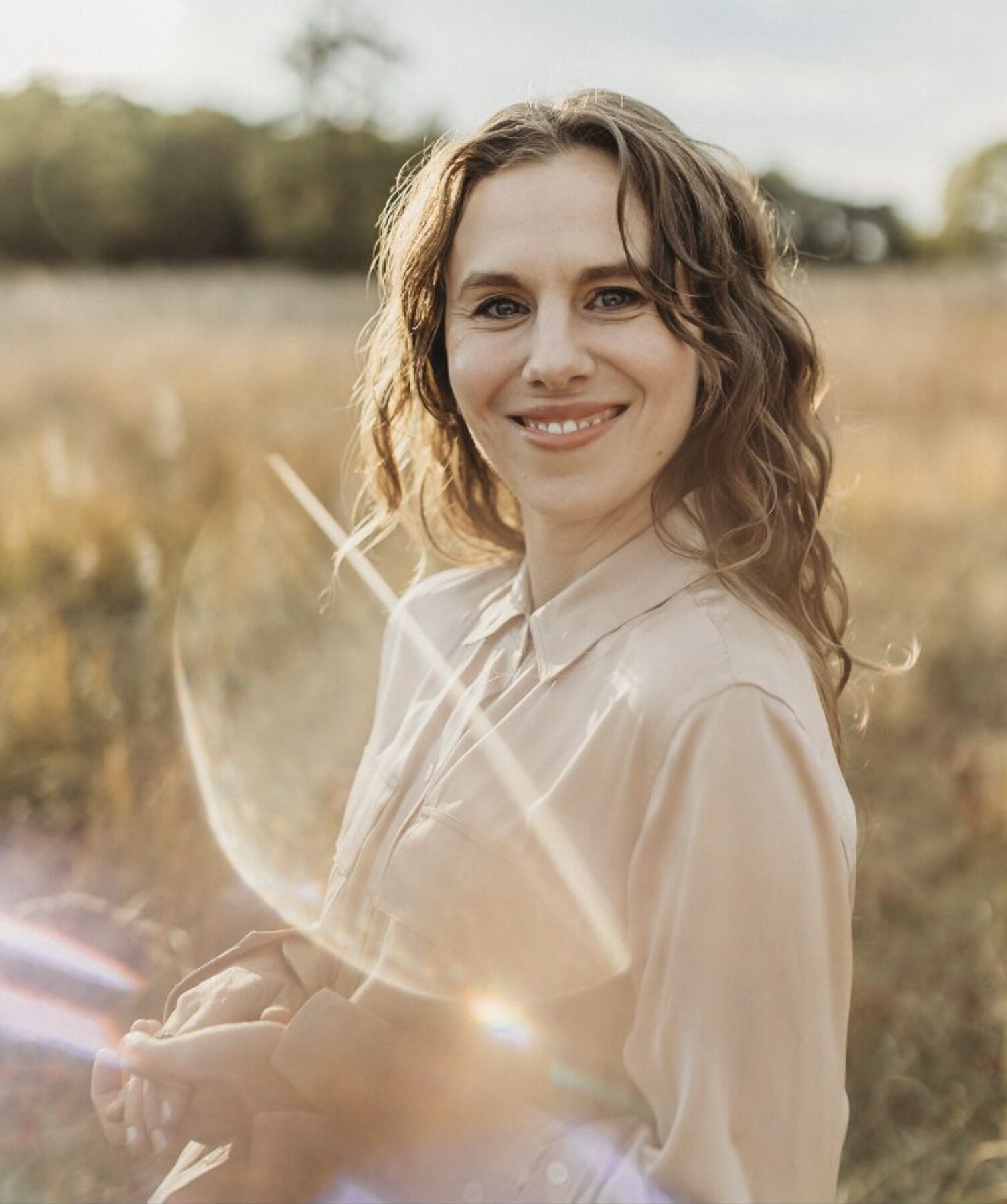 Dasha Gaian in a sunlit field